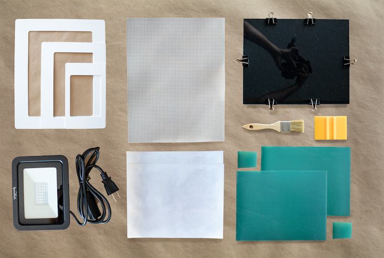 Screen printing kit with UV exposure light and frame set flat lay